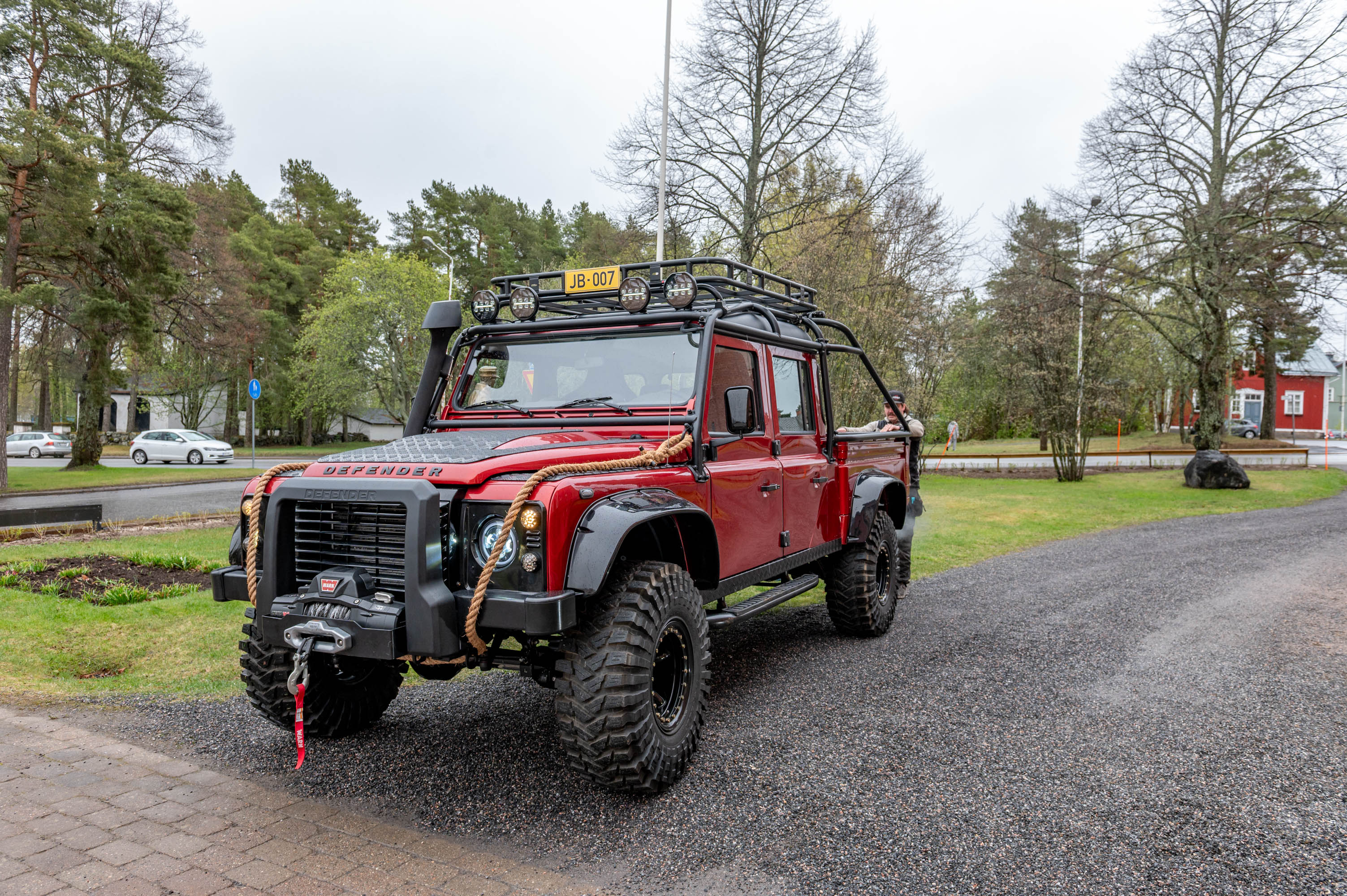 Defender 130 Spectre Replica — Rimini Red — Front 3/4 View